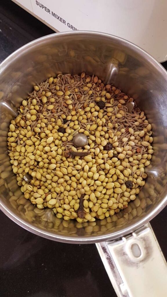 Dry roasted spices in a mixie jar