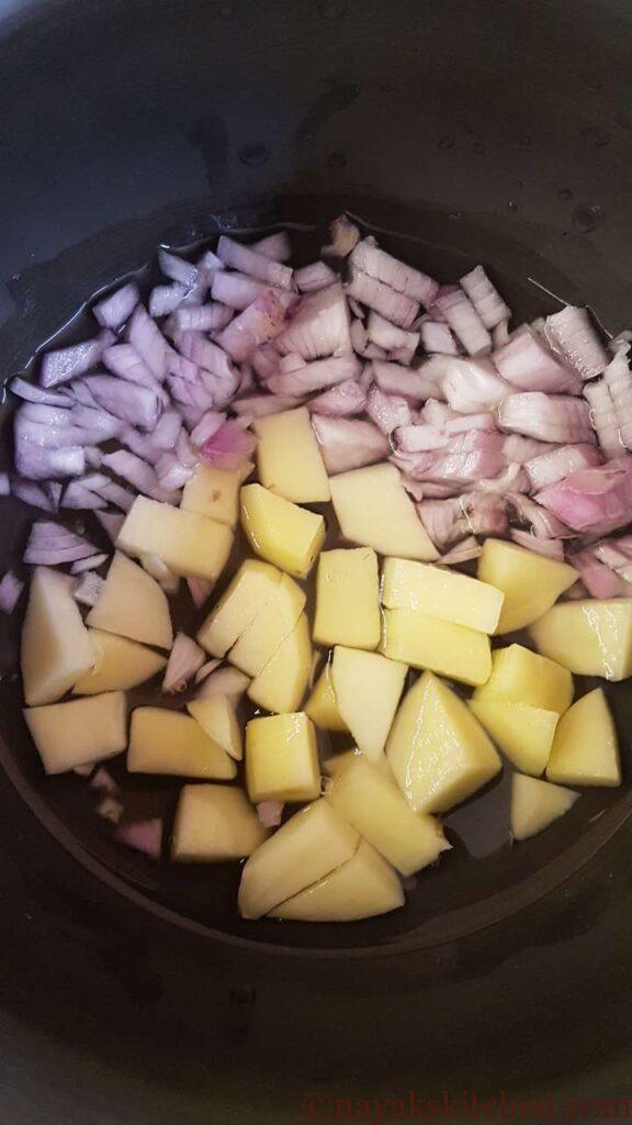 Chopped onion and potato for simple clam recipe
