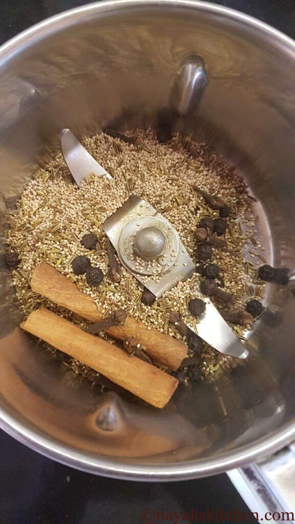 Roasted spices in a mixie jar