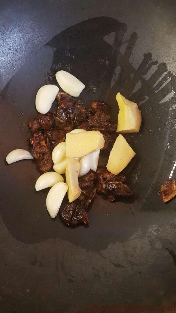 Adding garlic and ginger