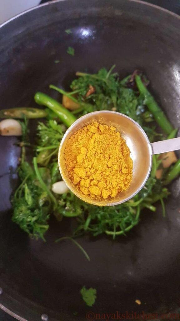 Adding turmeric powder