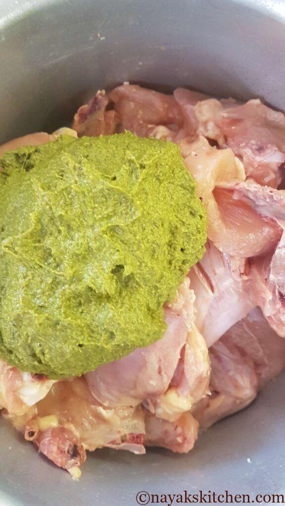 Adding chicken cafreal masala