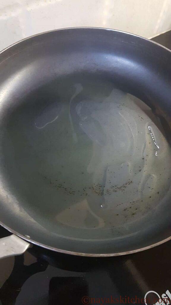 Adding oil to a pan