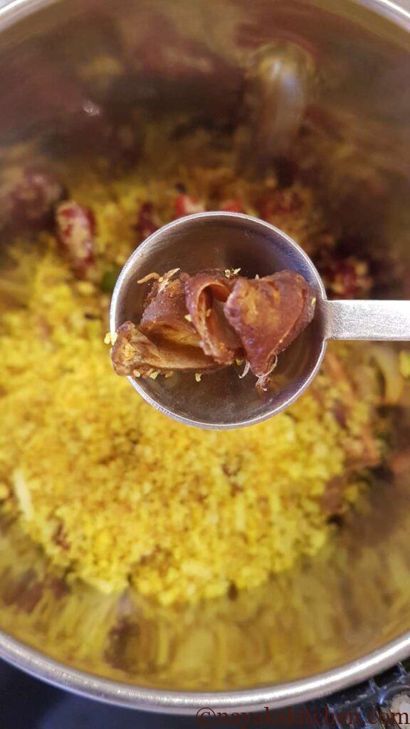 Adding tamarind to mixie jar