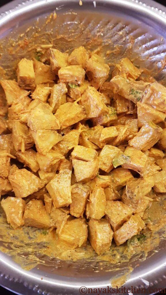 Mixing everything and marinating jackfruit pieces