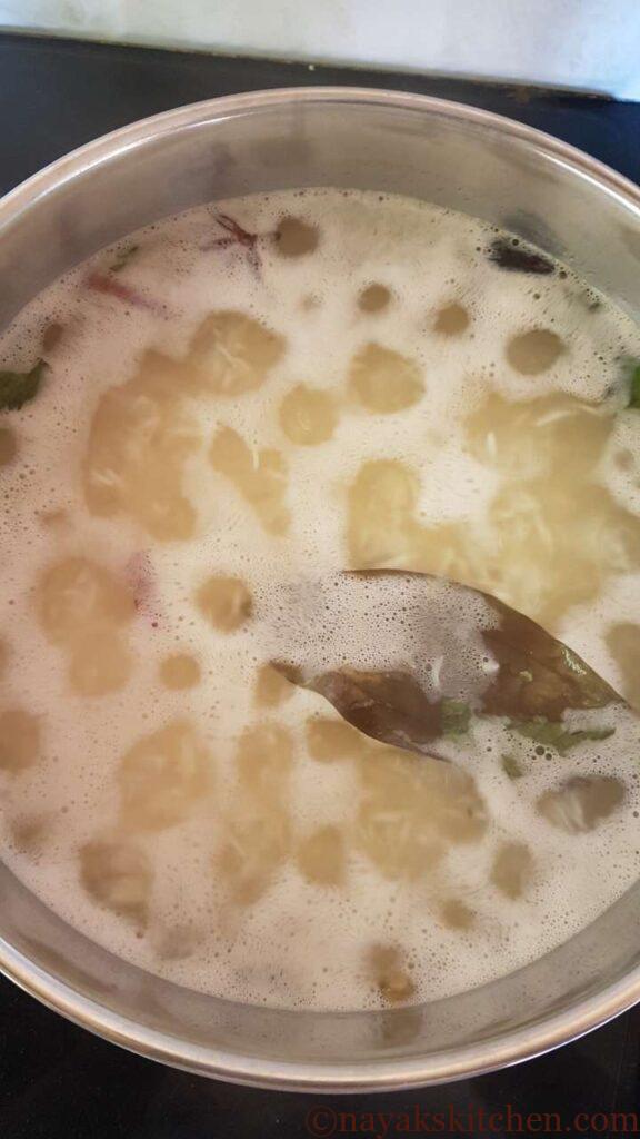 Cooking rice for Kathal Biryani