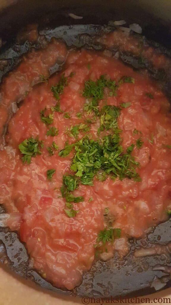 Adding chopped coriander