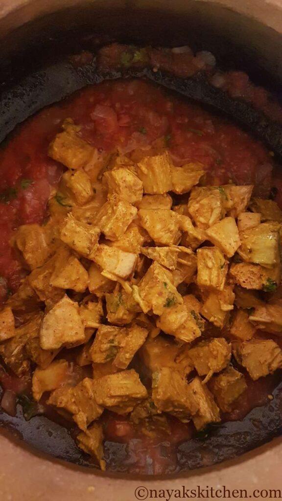Adding marinated jackfruit chunks