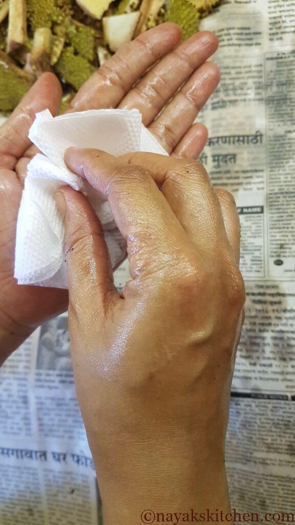 Wiping off hands with tissue