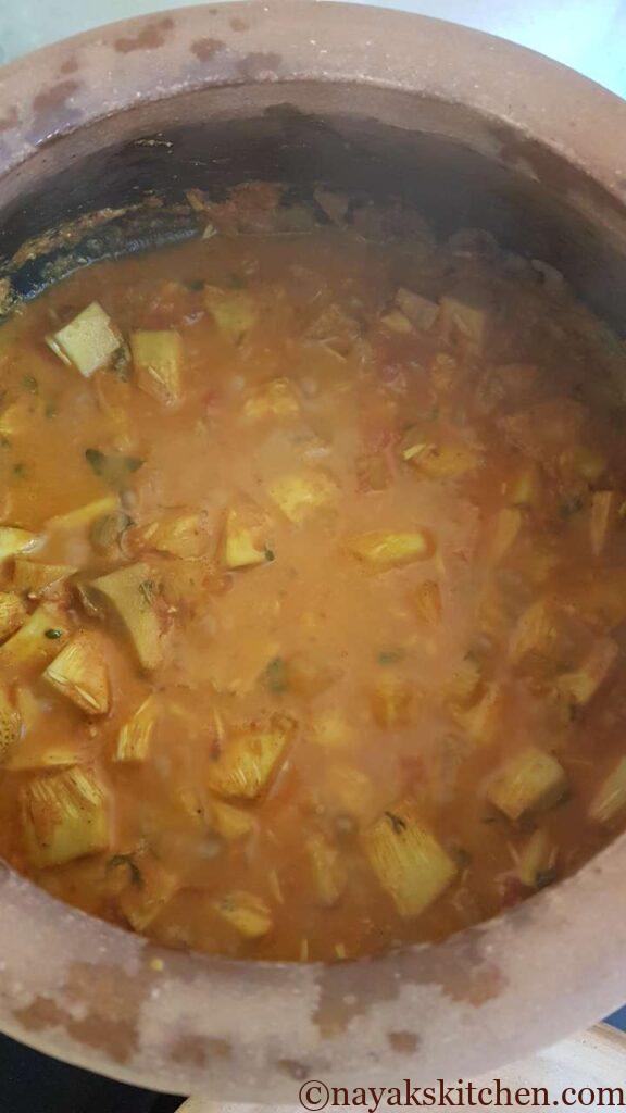 Jackfruit chunks cooking in gravy