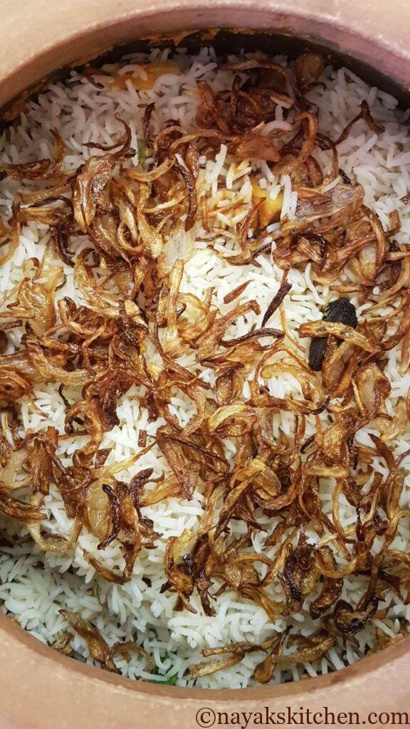 Adding fried onion