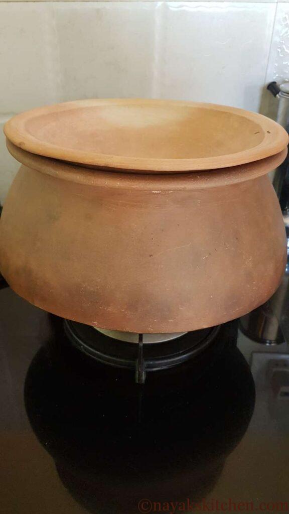 Cooking raw jackfruit biryani on dum