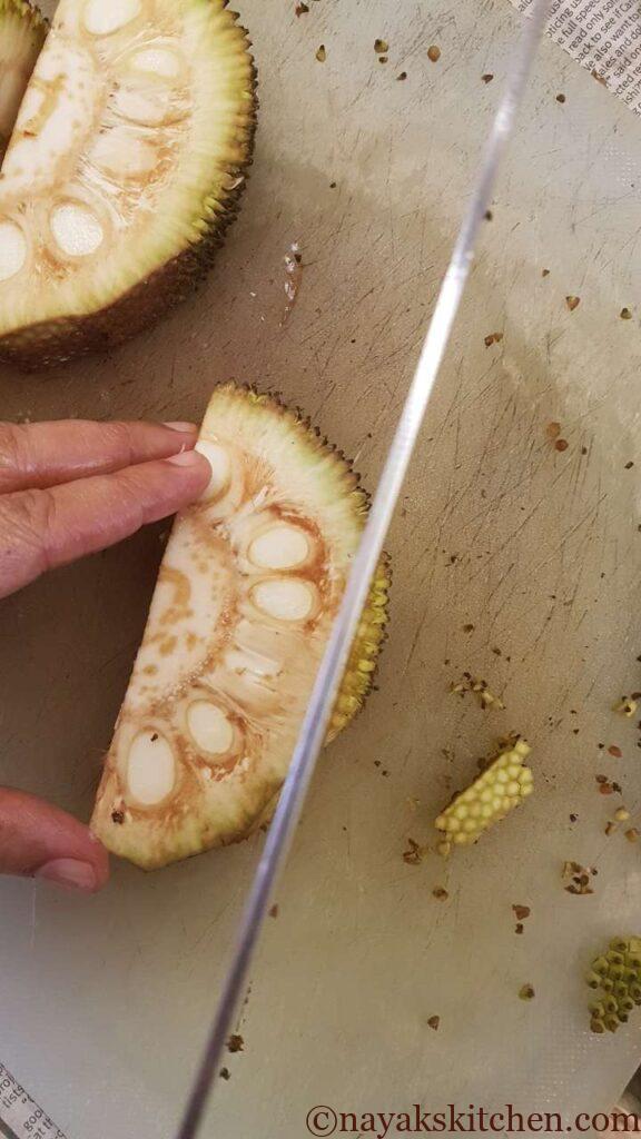 Learn how to cut a raw jackfruit.