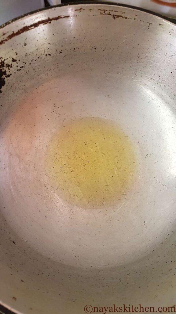 Heating oil for raw jackfruit recipe or Chaako