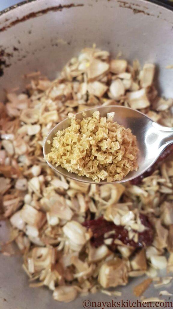 Adding salt to raw jackfruit recipe