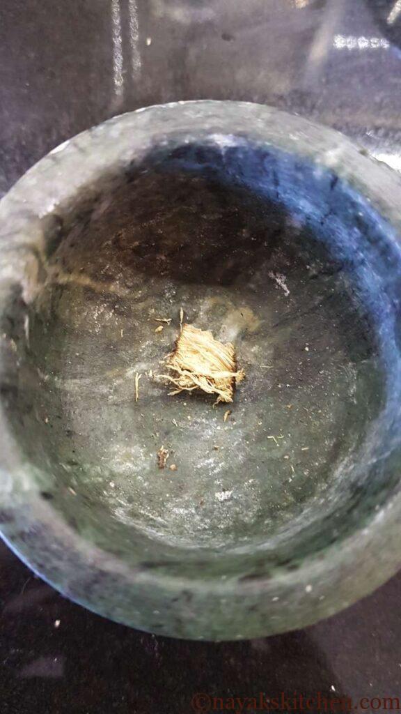 Asafoetida in a mortar and pestle