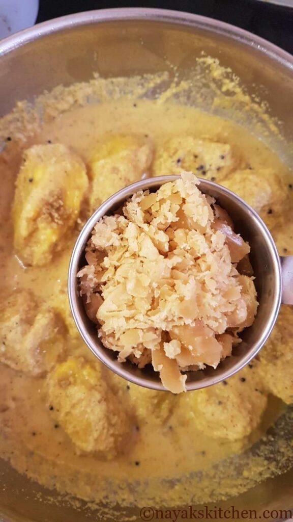 Adding jaggery to mango sasav
