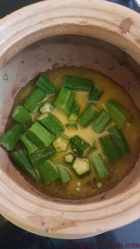 Adding water to cook ladies finger